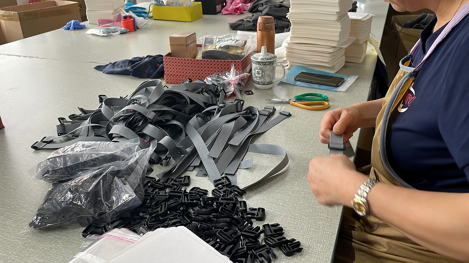 Buckle and webbing assembly